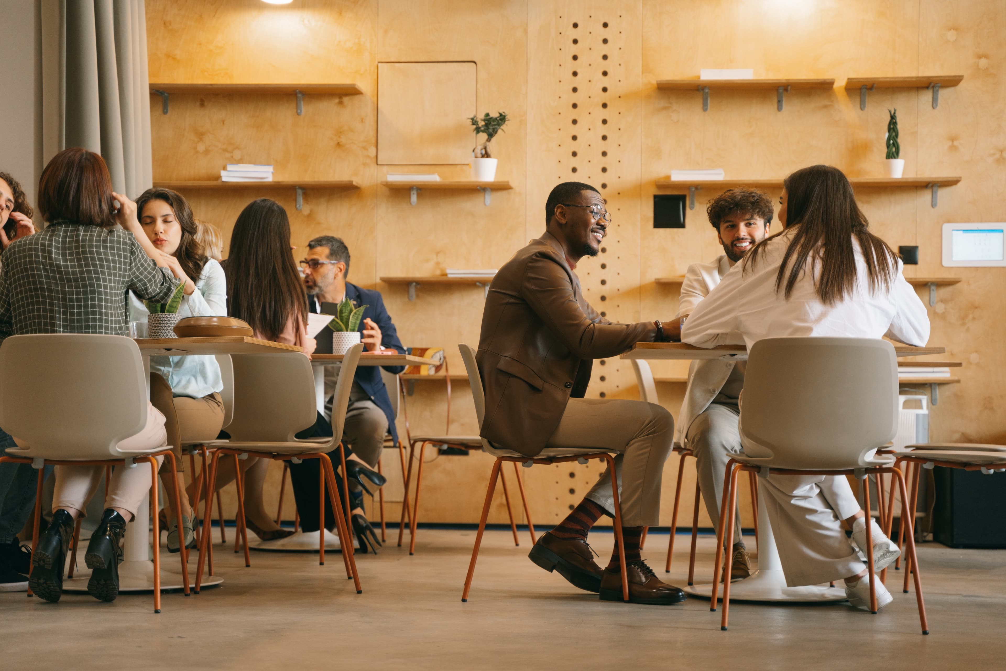 Professionals talking in a coworking space